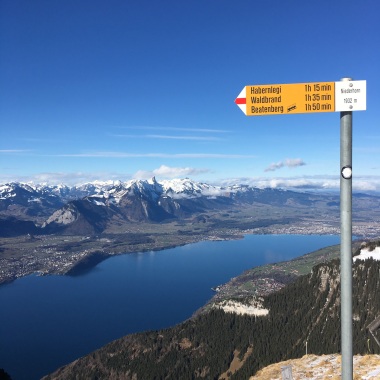 View of Lake Thun and Alps from the top of the Niederhorn